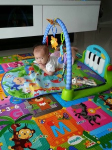 Fisherprice Piano Play-gym, create music as she plays! She loves the blue elephant with big red ears.