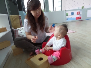 Sitting on a bumbo chair